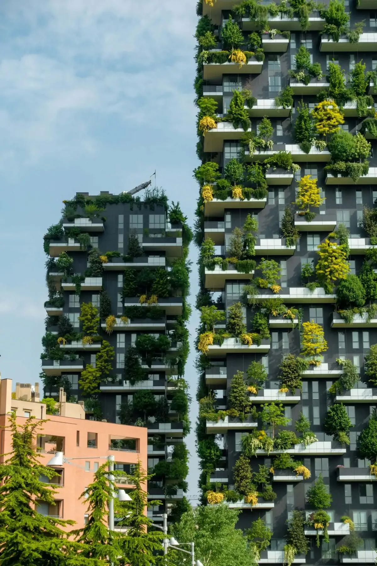 Bosco Verticale in Milano representing the city's luxury real estate boom and executive career opportunities tied to new wealth inflows